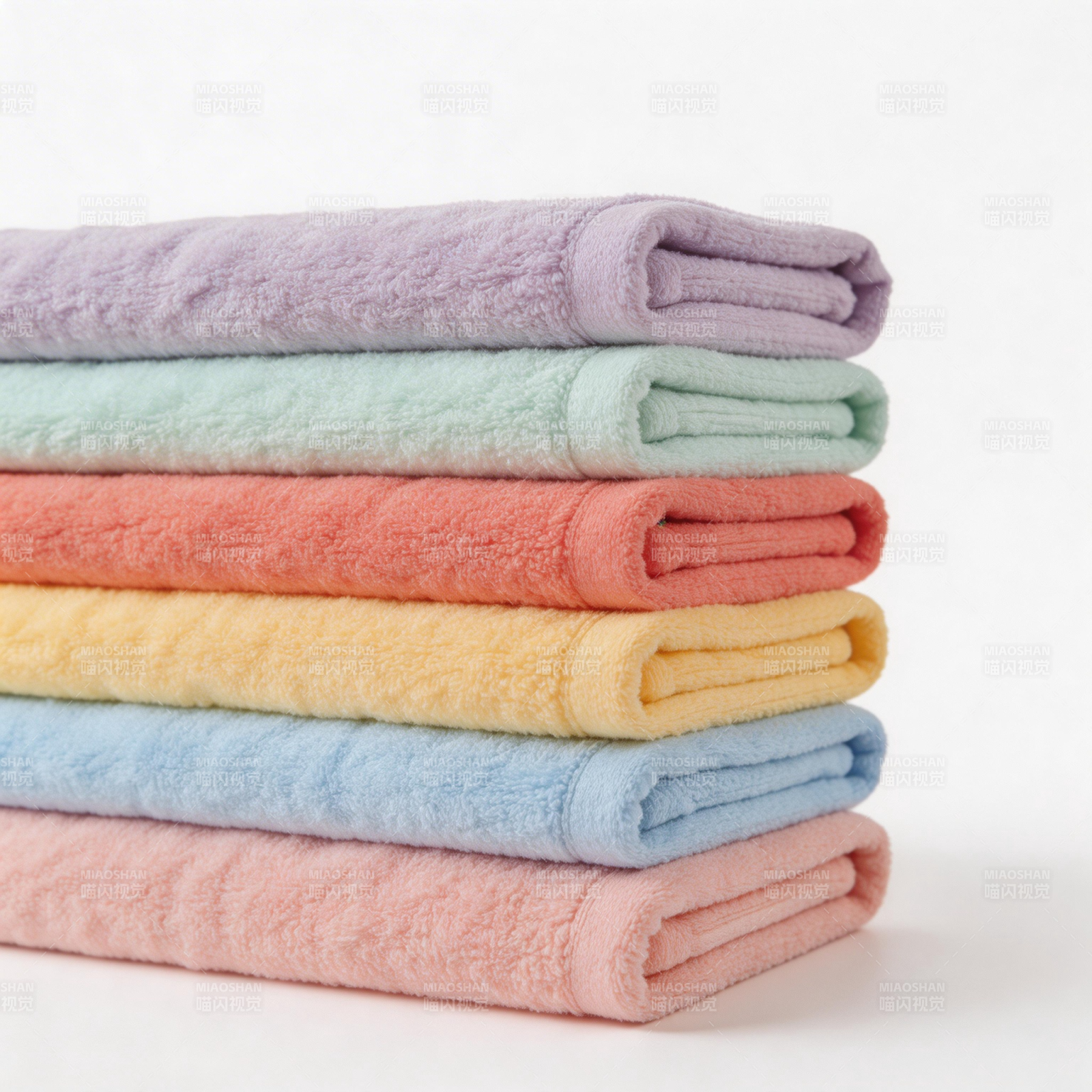 彩色毛巾叠放图片