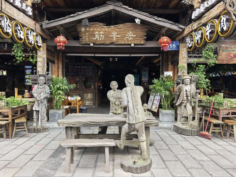 古风茶馆石雕景图片