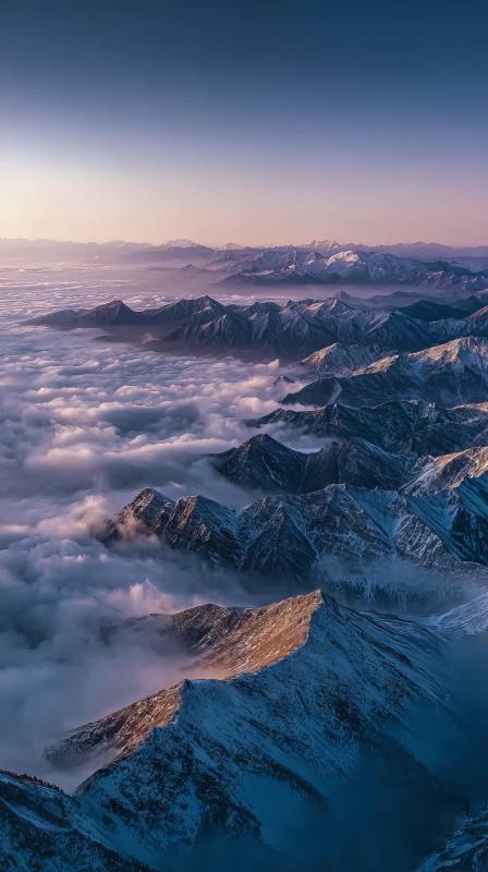 云海雪山晨曦图片