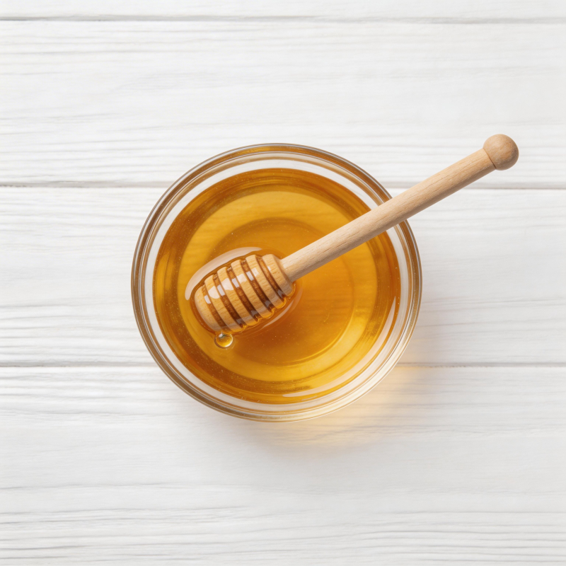 蜂蜜与木勺静置图片