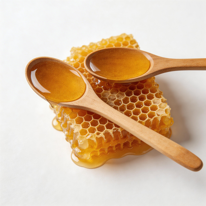 蜂蜜与木勺图片