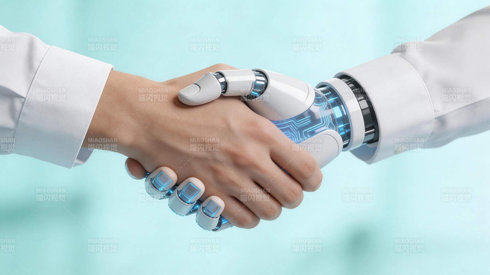 人类手与机械手臂握手展现人机协作场景图片