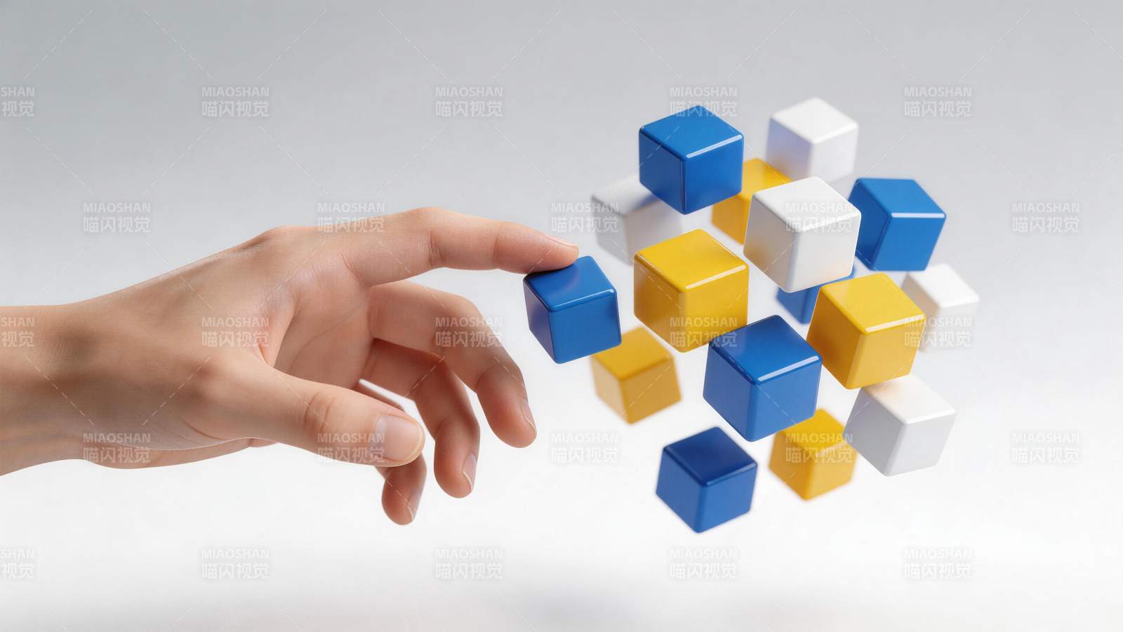 手触碰悬浮彩色立方体组合结构图片