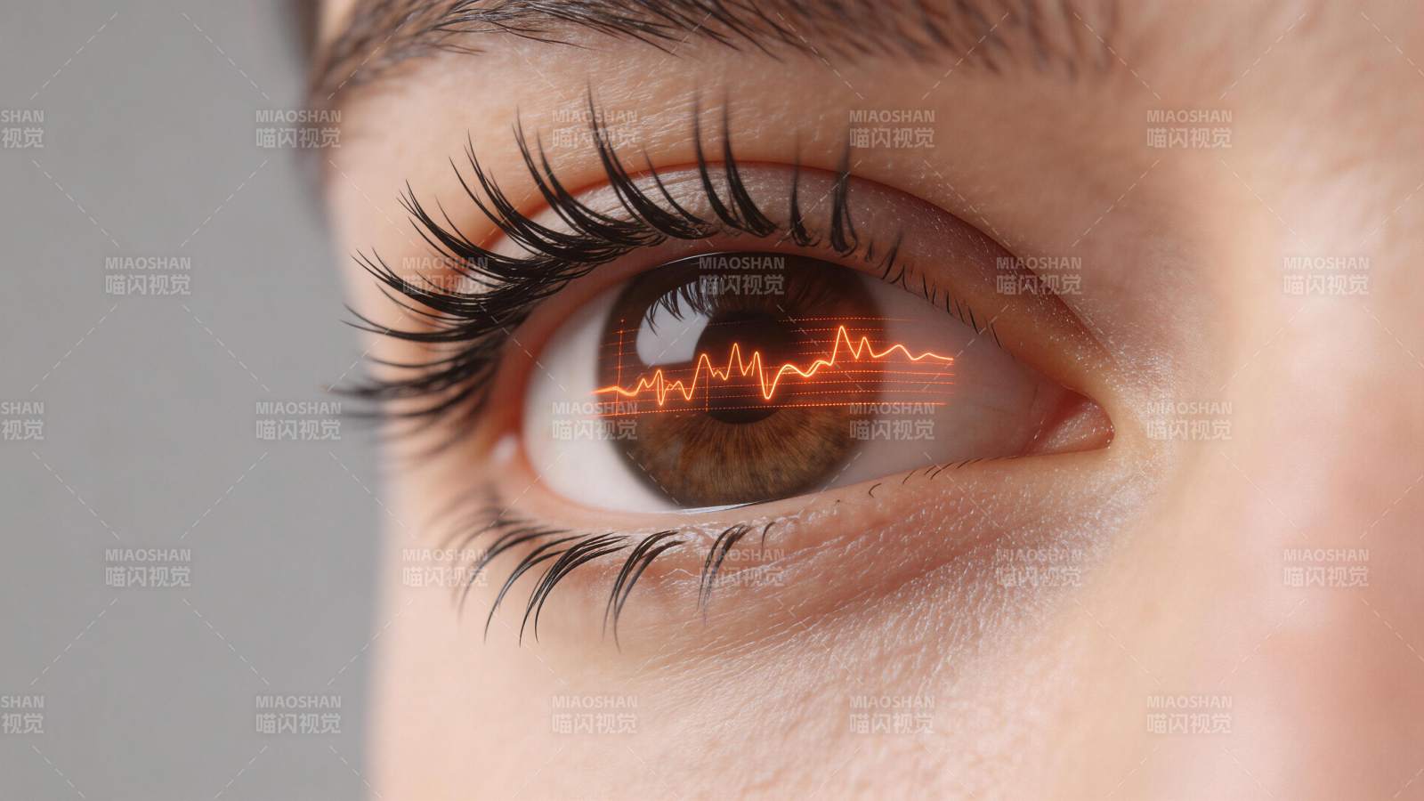 人眼虹膜中显示橙色心电波形图案图片
