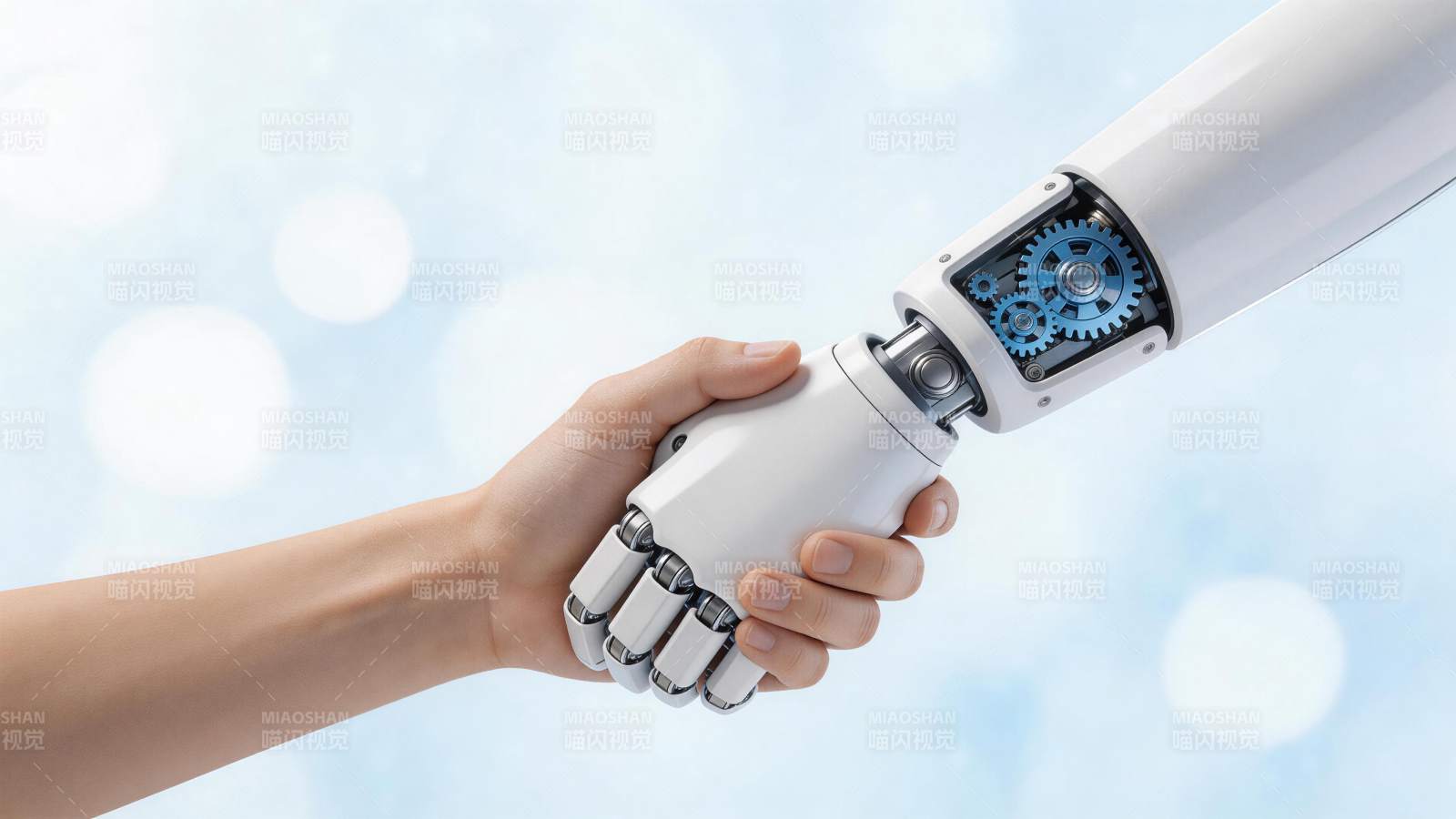 人类手掌与机械手臂握手特写画面图片