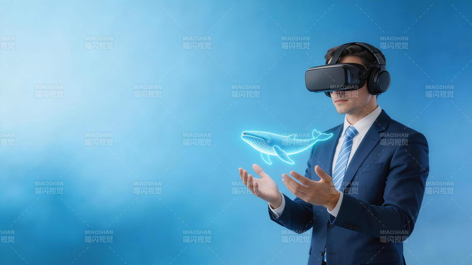 男子佩戴VR设备观看全息鲸鱼影像图片
