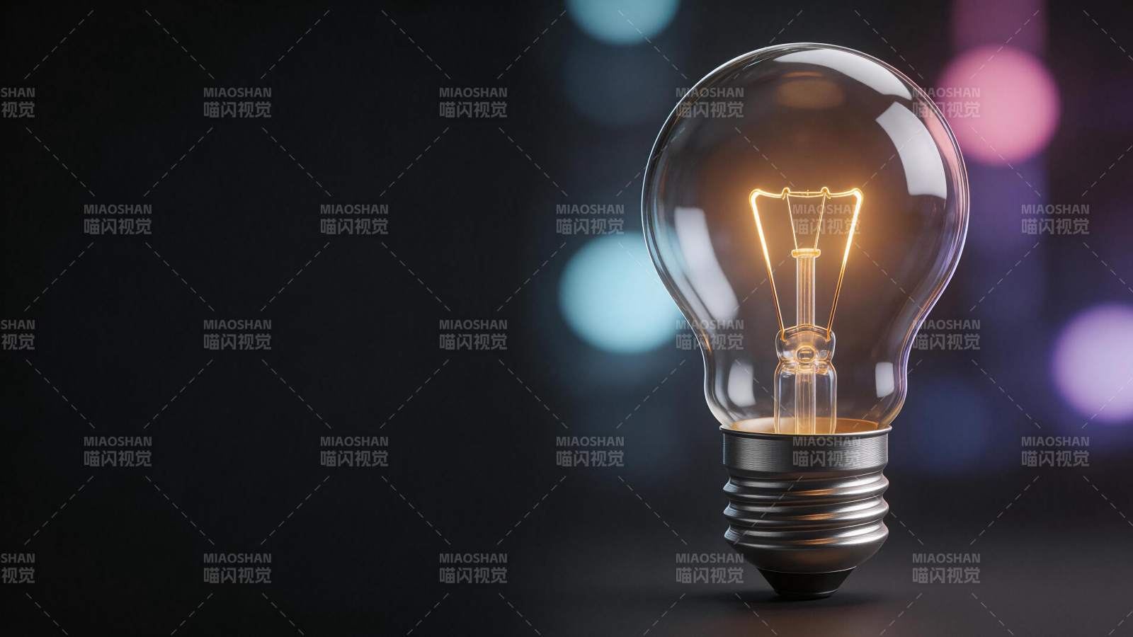 发光白炽灯泡特写背景虚化光斑图片