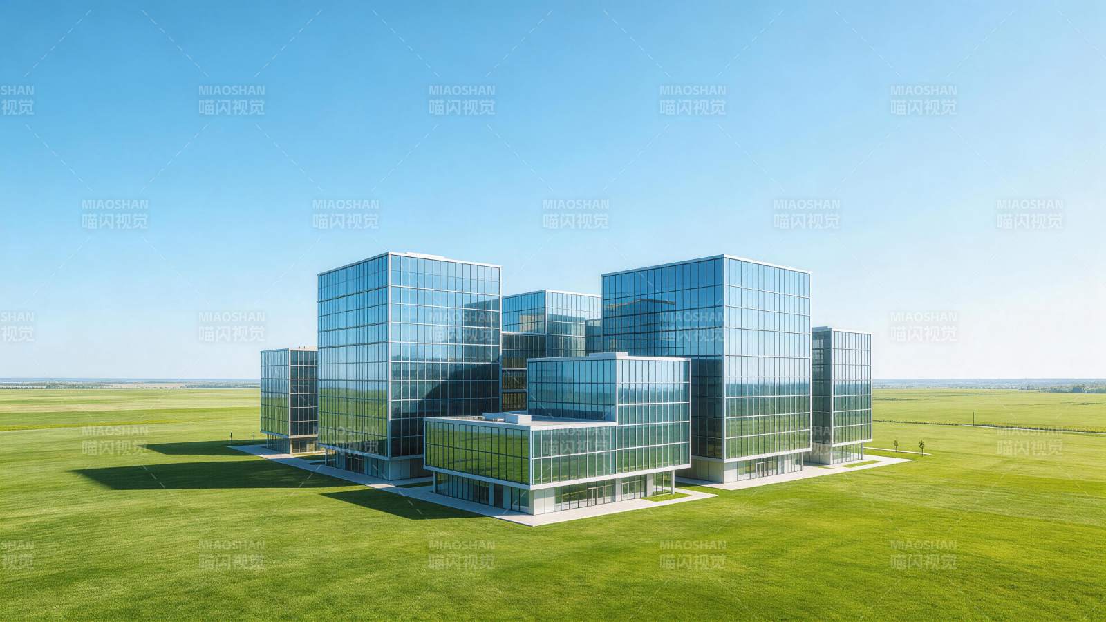 玻璃幕墙现代建筑群矗立于广阔绿野之上图片