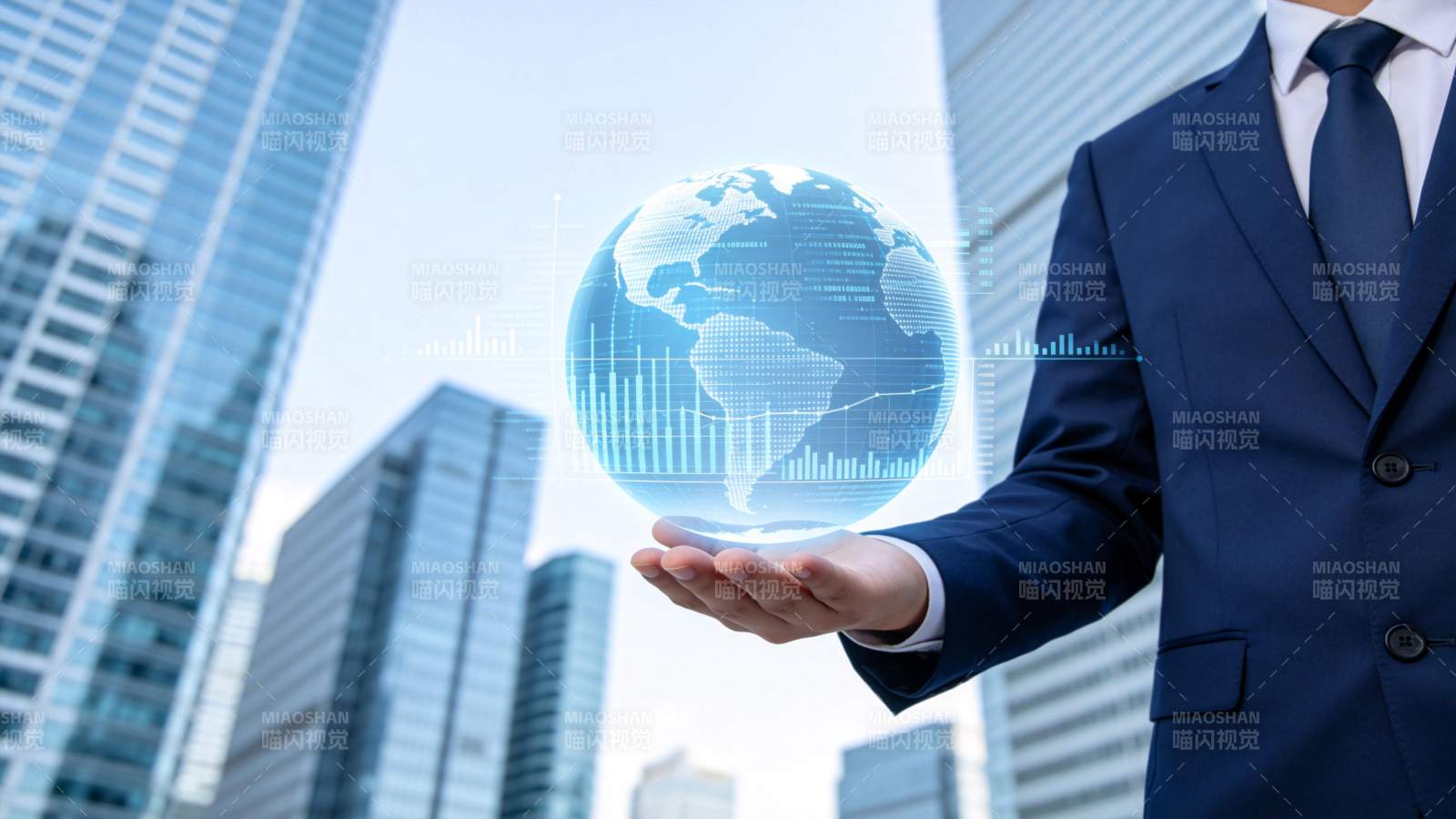 商务人士托举全息地球与数据图表图片