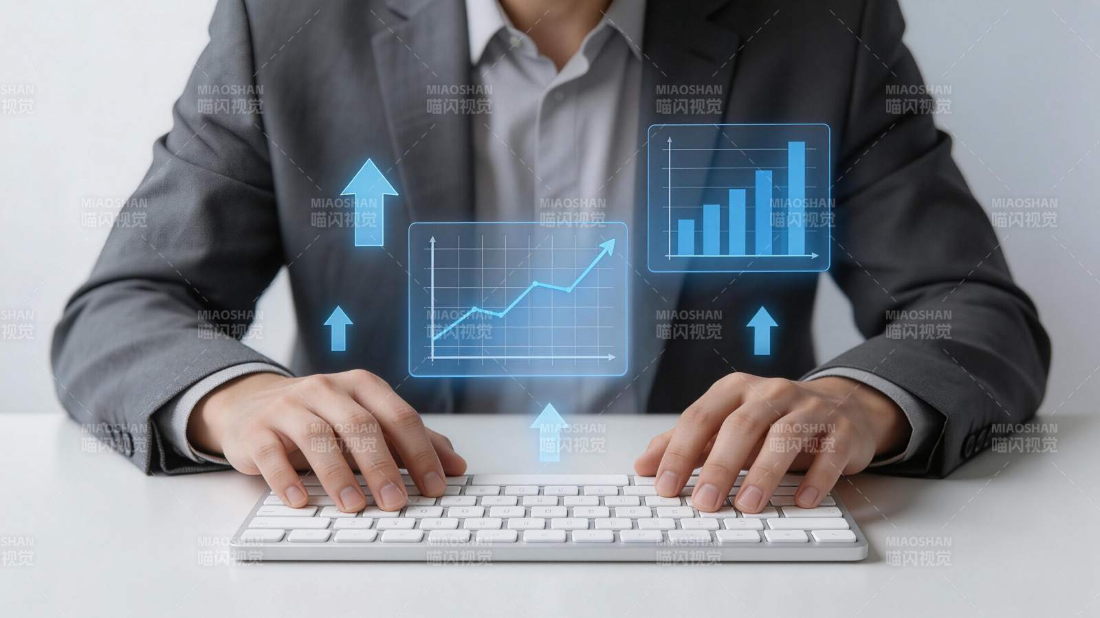 商务人士操作键盘显示数据增长图表图片