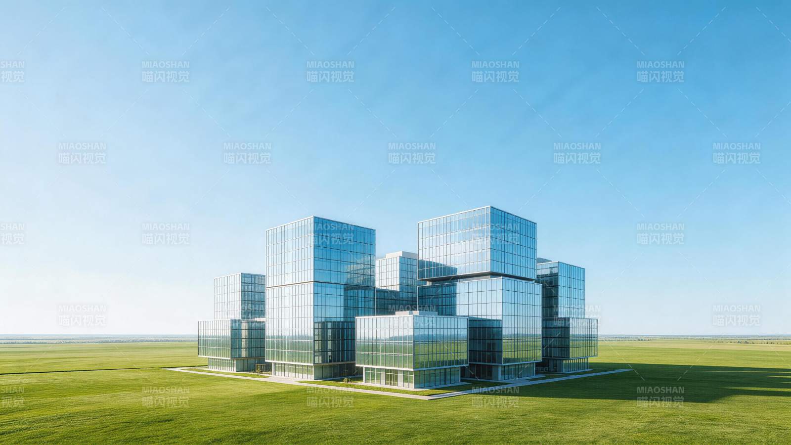 玻璃幕墙立方体建筑群矗立绿色草原之上图片