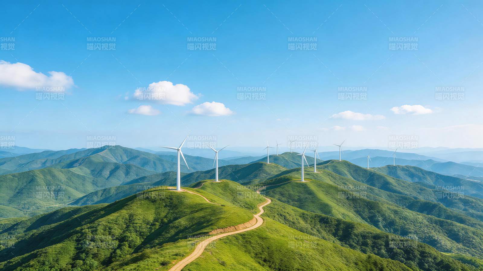 绿色山丘上排列的白色风力发电机群图片