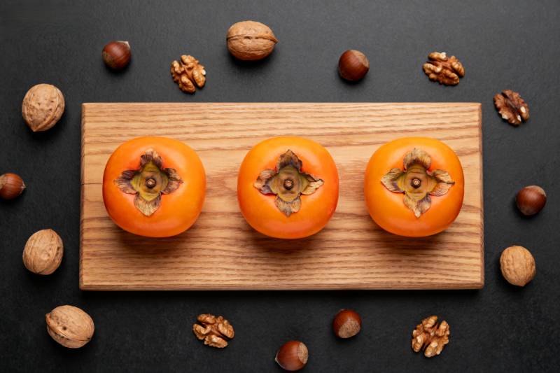 柿子与坚果静物图图片