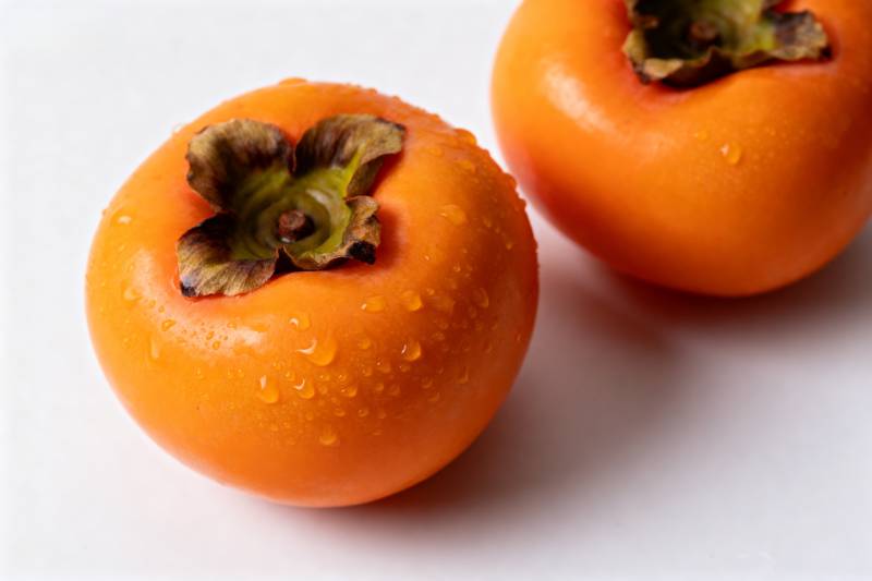 晶莹柿子特写图片