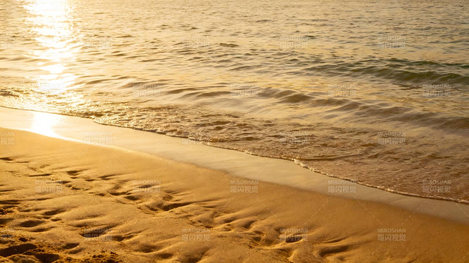 金色沙滩日落美景图片