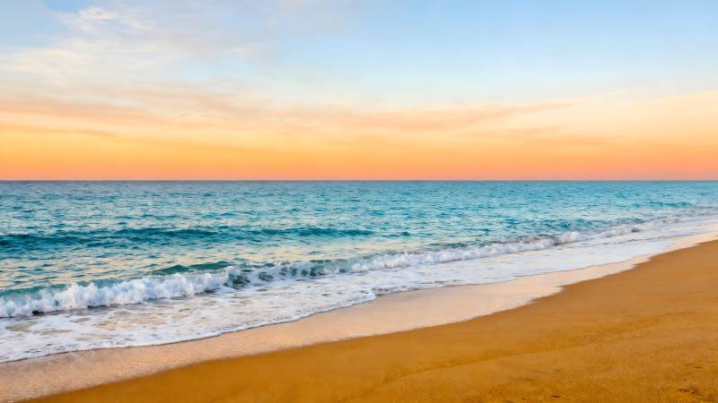 夕阳海滩美景图片