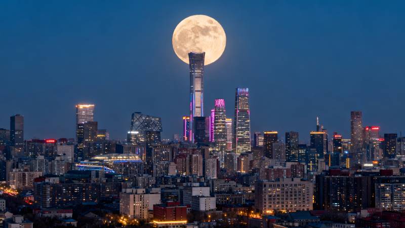 月升城市夜景图片