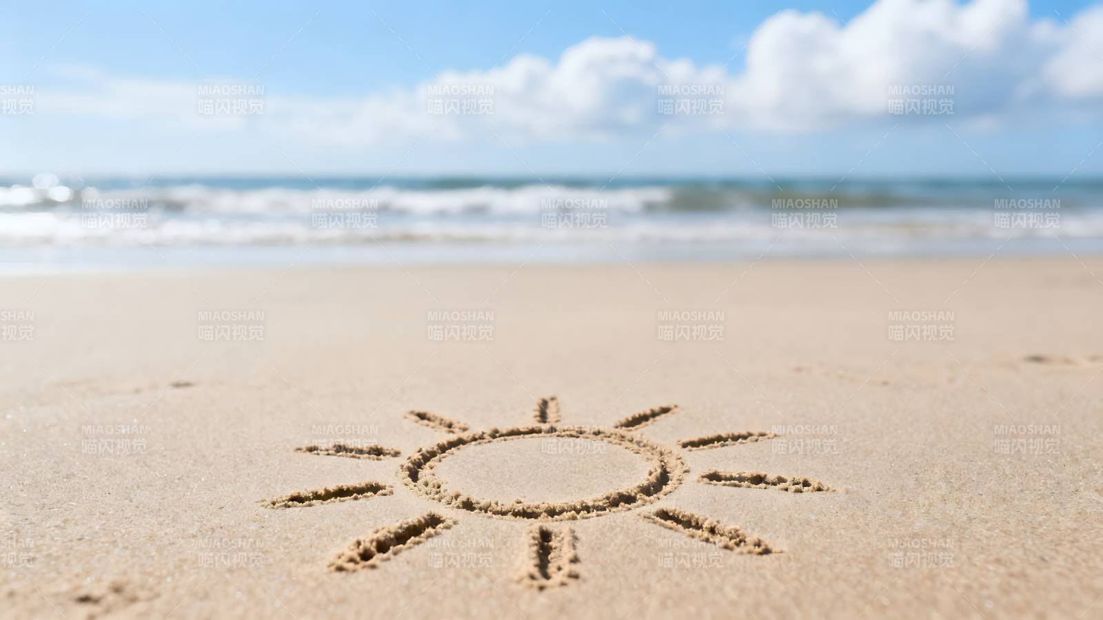 沙滩上的太阳图案图片