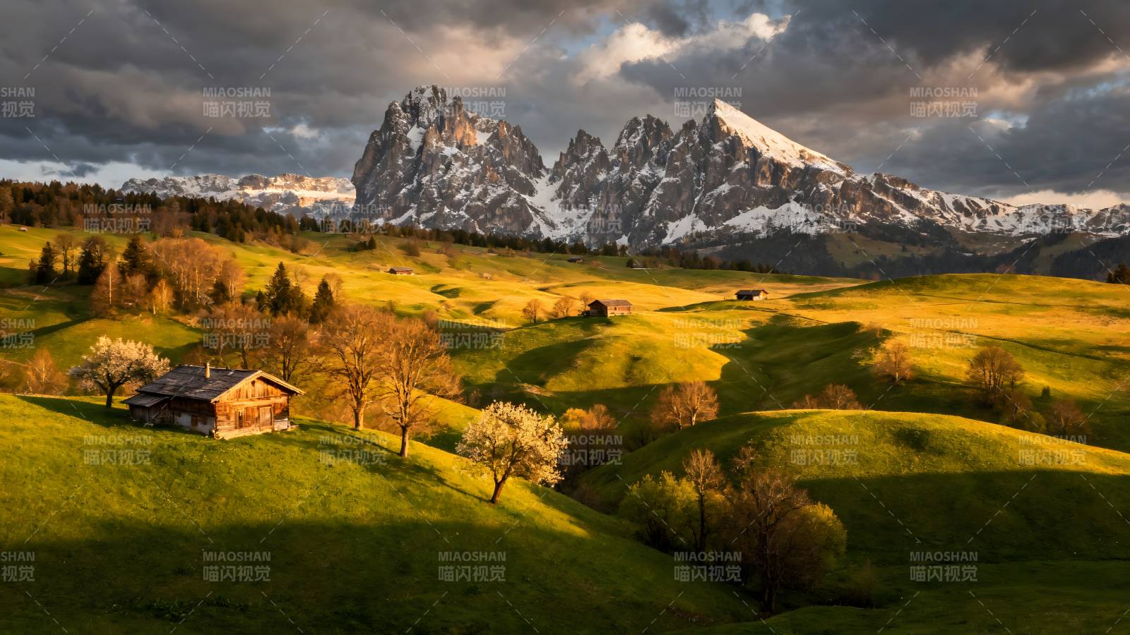 雪山下的田园风光图片