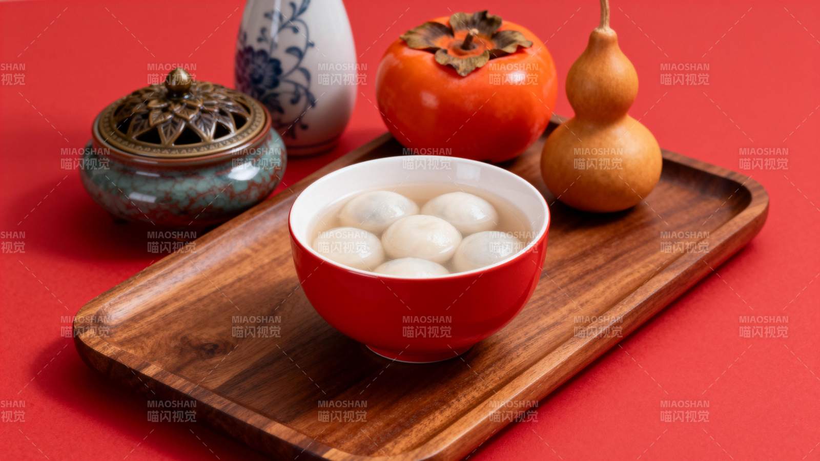 红碗汤圆配柿子图片