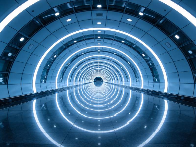 蓝色环形灯光隧道内部结构透视图图片