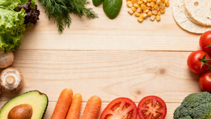 新鲜蔬果围边木桌背景图片