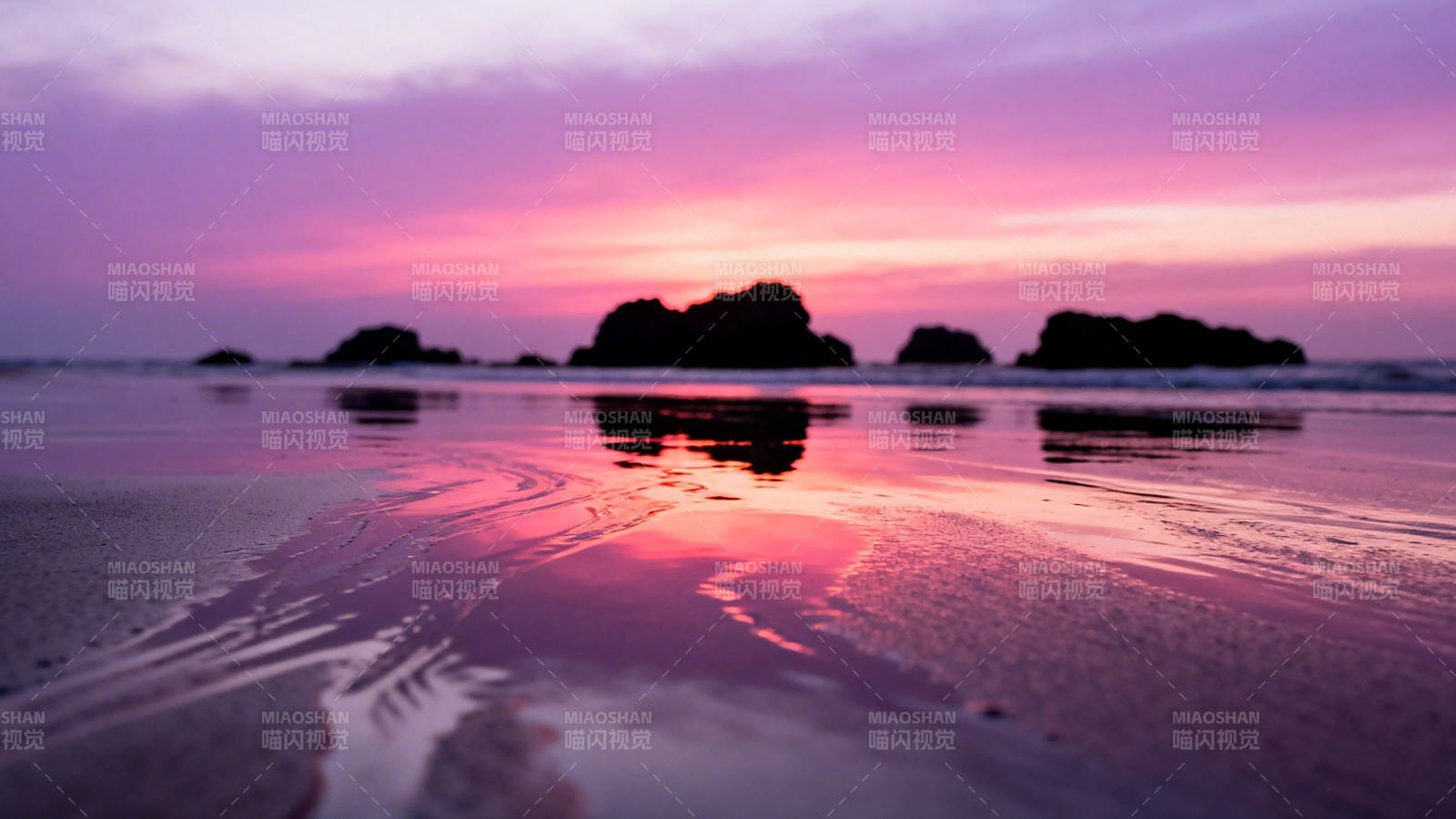紫霞映海 礁石剪影如梦图片