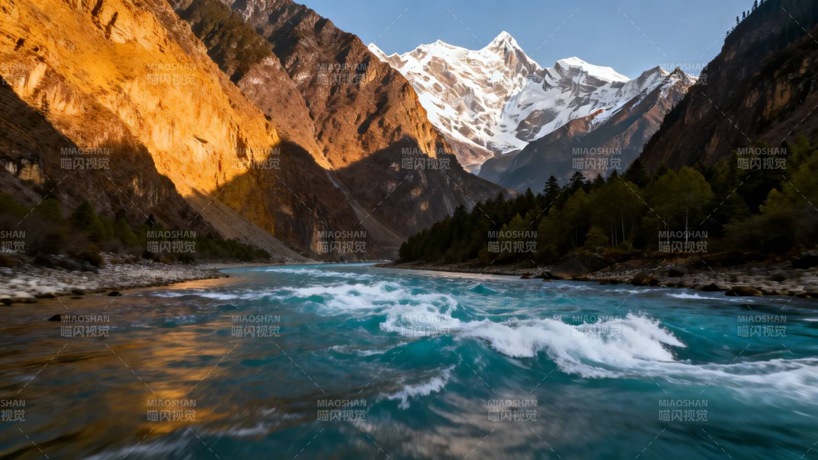 雪山映碧流 峡谷金辉耀图片