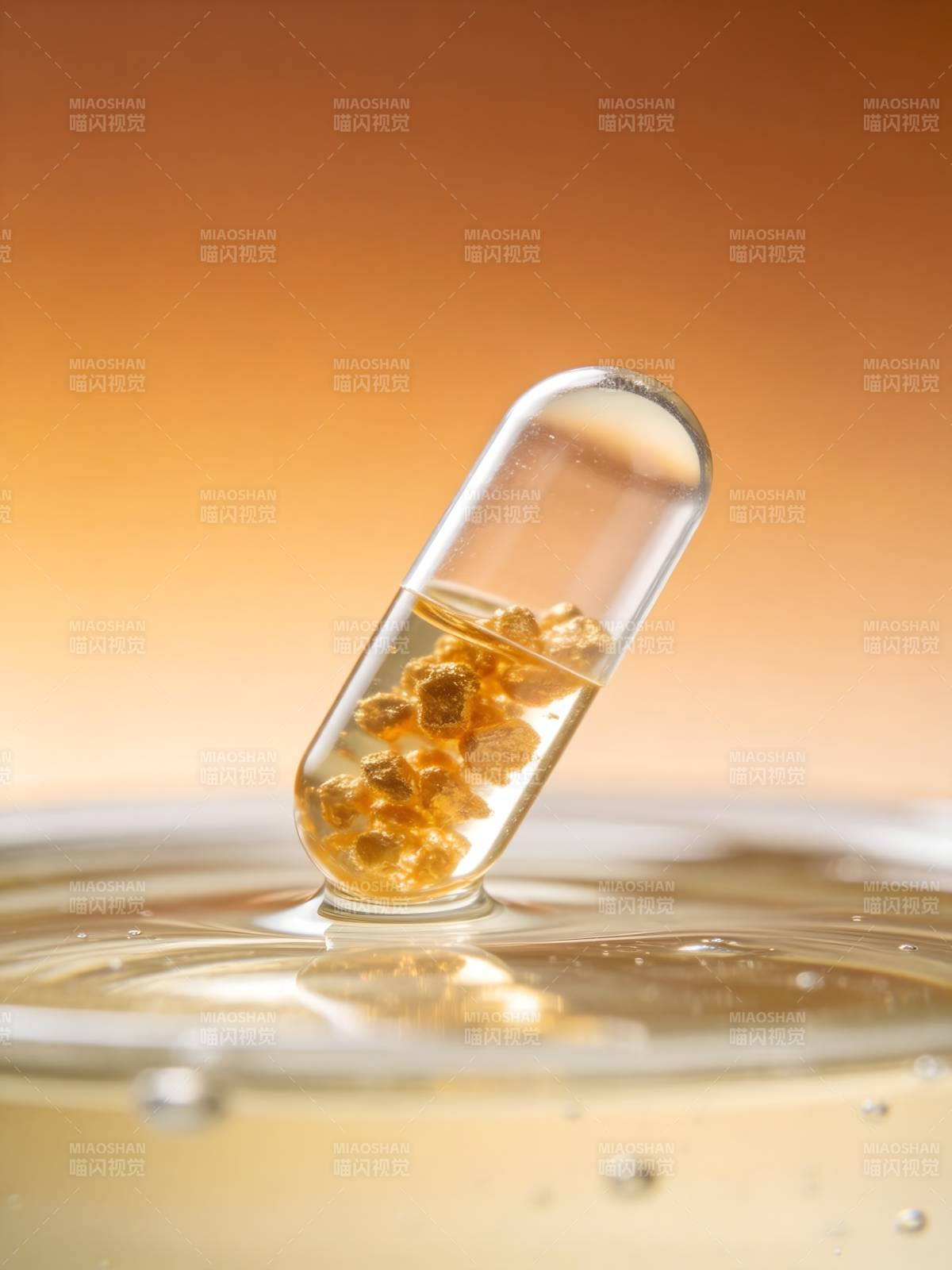 胶囊滴落 金光闪烁瞬间图片