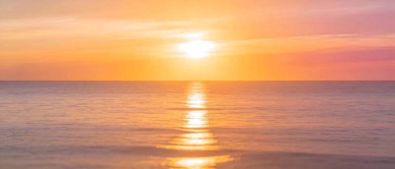 夕阳熔金 海天一色图片