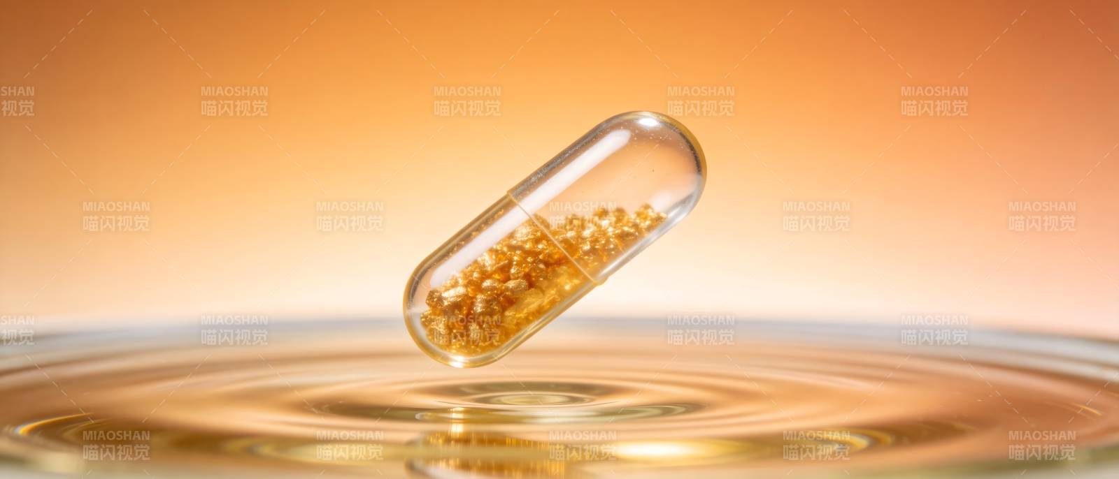 胶囊滴落 金液涟漪图片