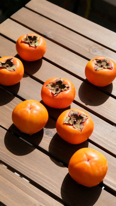 阳光下的柿子静物图图片