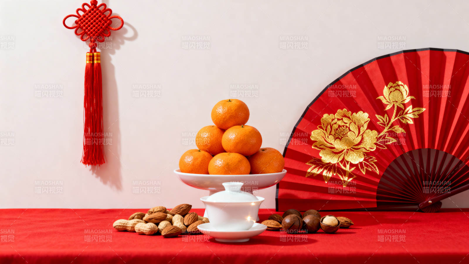 春节喜庆摆设 橘子 扇子与中国结图片