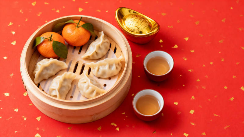 春节美食 饺子橘子金元宝图片