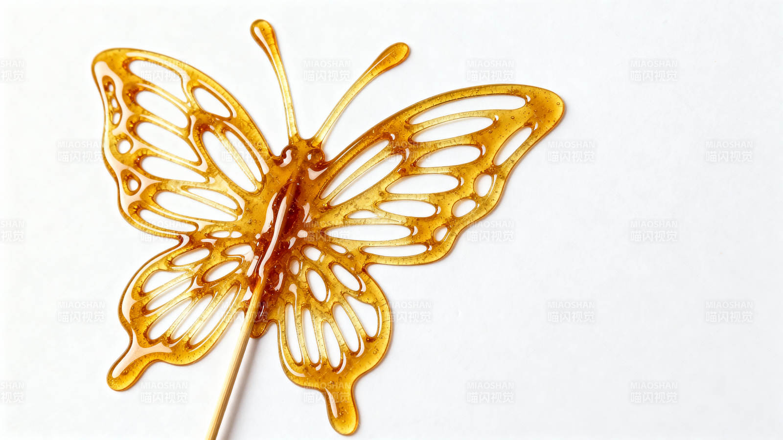 糖画蝴蝶 金黄透亮图片