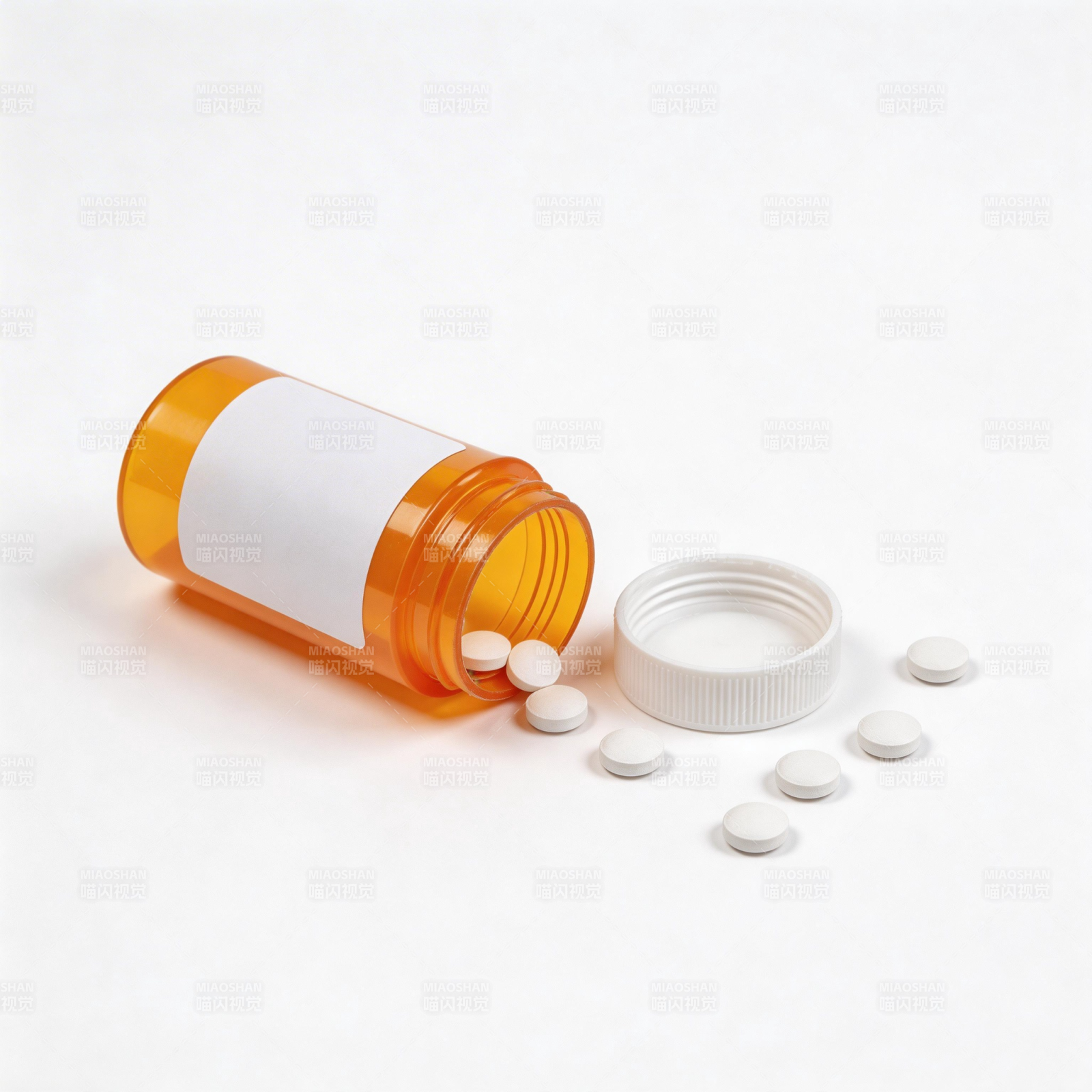 药瓶倾倒 白色药片散落图片