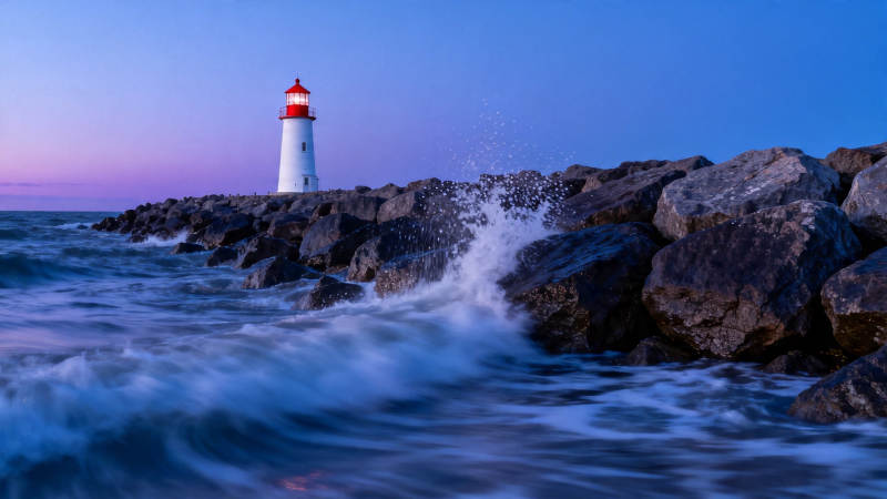 灯塔守夜 浪拍礁石图片