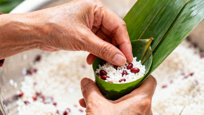 巧手包粽 米豆入叶香图片