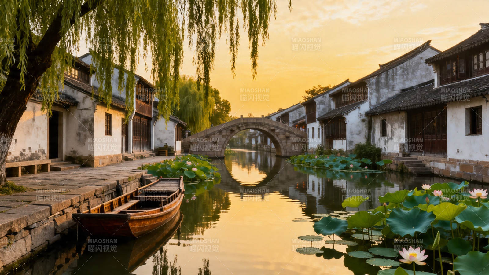 江南水乡 夕阳古桥舟影图片