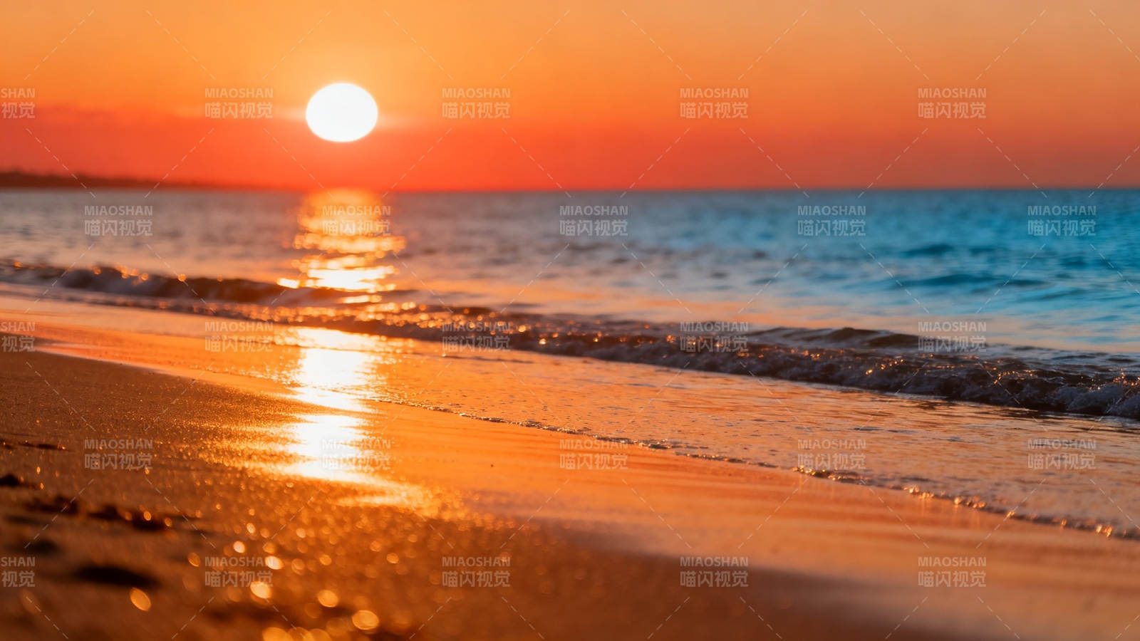 夕阳金浪吻沙滩图片