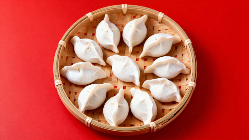 红底竹笼蒸饺香图片