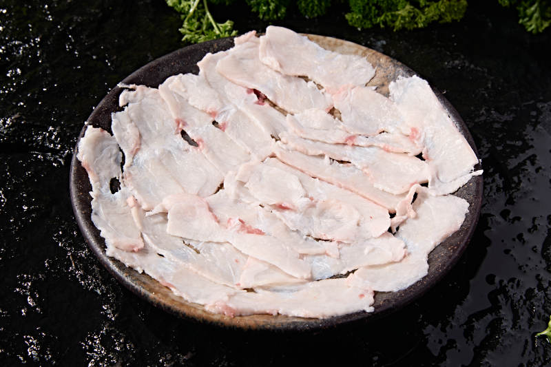 火锅涮煮荤类食材薄切生牛胸口图片