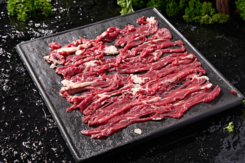 潮汕火锅涮煮荤食鲜切雪花生牛肉片图片