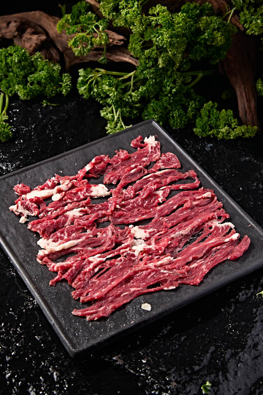 潮汕火锅涮煮荤食鲜切雪花生牛肉片图片
