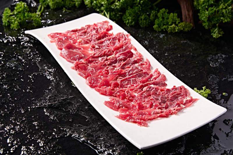 潮汕火锅涮煮荤食材鲜切生牛肉片图片