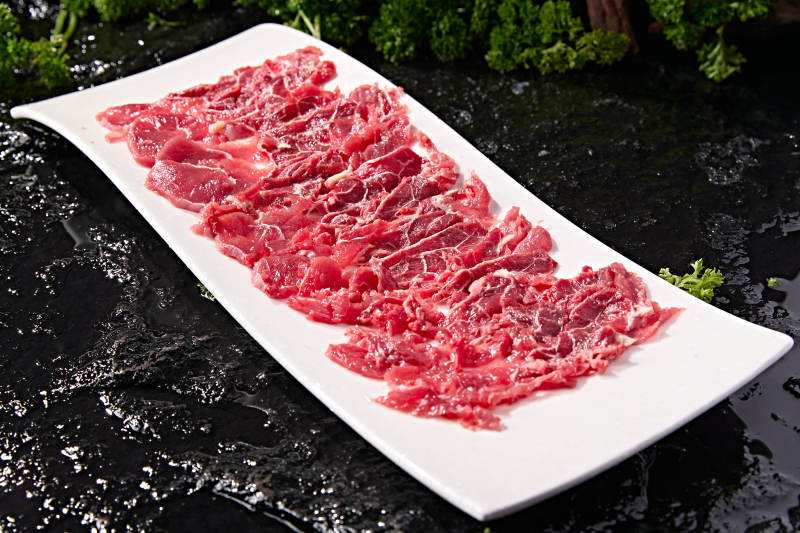 潮汕火锅涮煮荤食材鲜切生牛肉片图片
