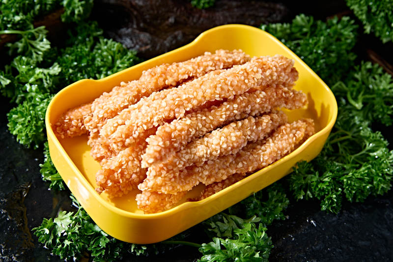 油炸芝麻鸡柳香酥鸡肉条图片