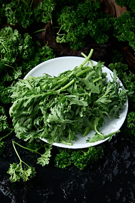 火锅食材新鲜茼蒿蒿子秆图片