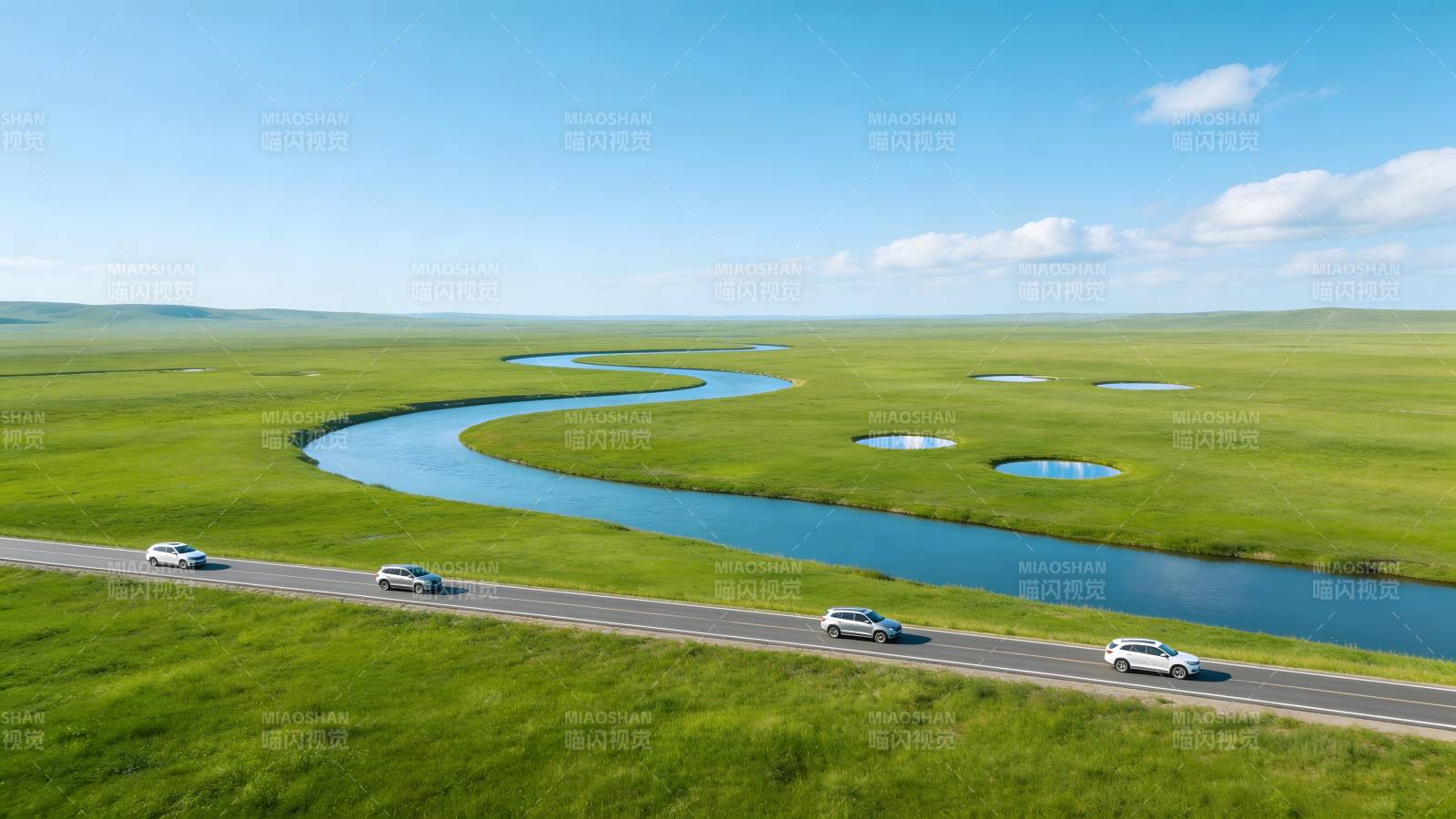 草原公路蜿蜒伴河行图片